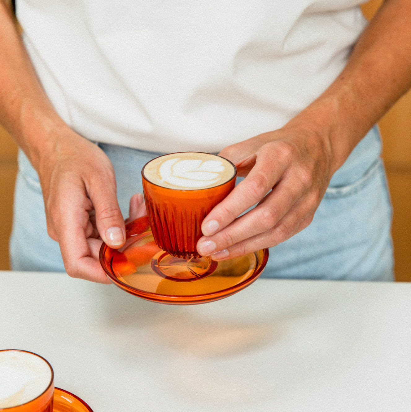 2 Espresso cups and store one saucer